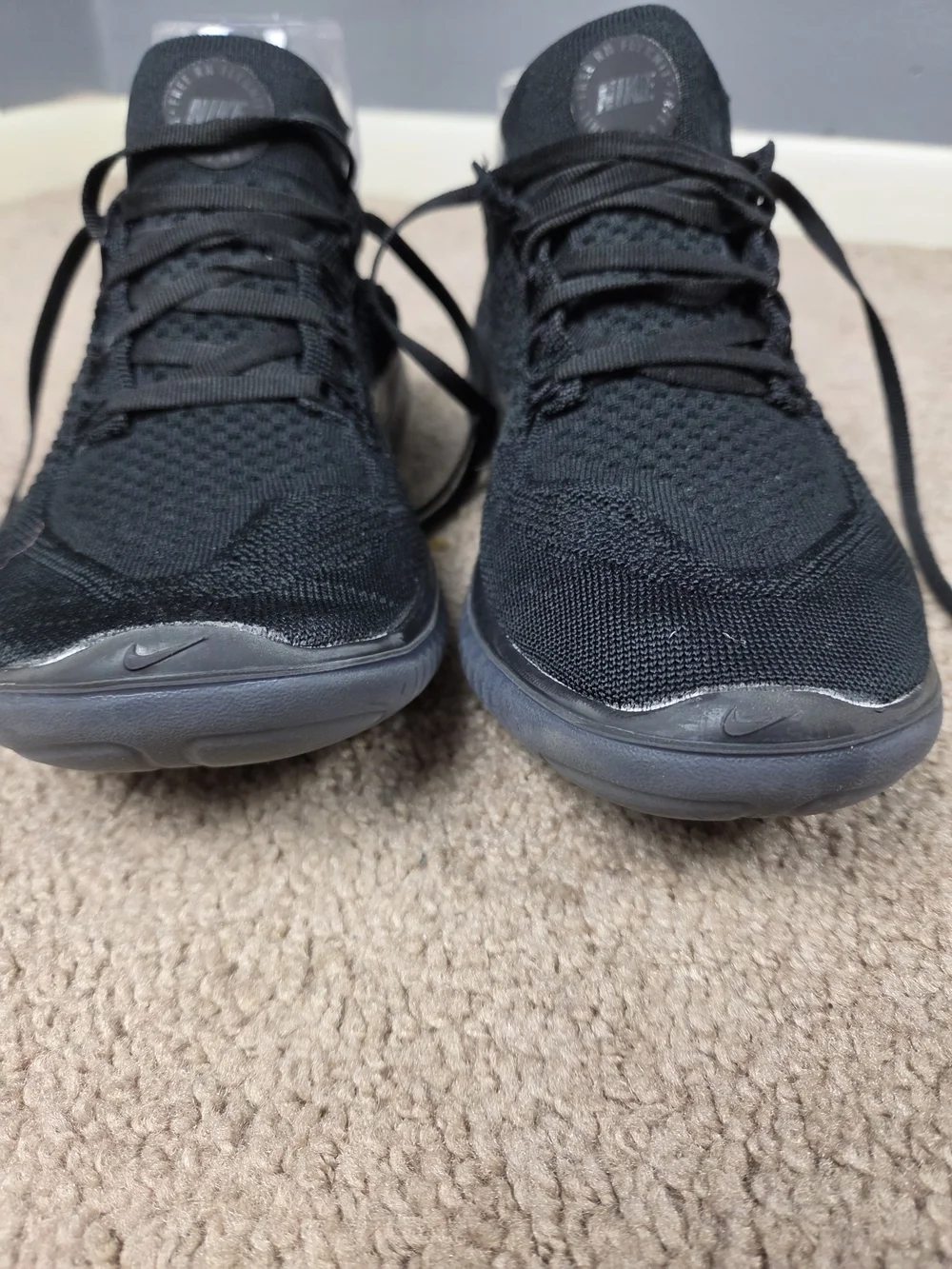 Nike Men's Black Knit Running Shoes with Green Accents